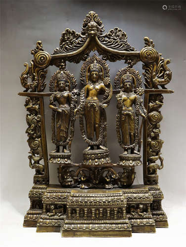 A BRONZE STANDING TARA GROUP