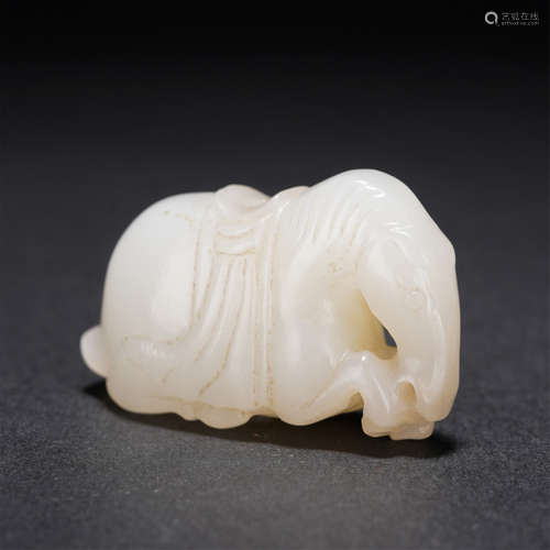 A CARVED WHITE JADE HORSE