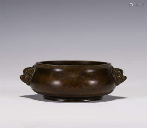 A BRONZE CENSER WITH MAKARA HANDLES