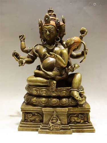 A BRONZE SEATED SHIVA