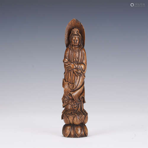 A CARVED ALOES-WOOD STANDING GUANYIN