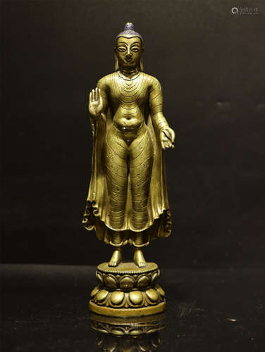 A BRONZE STANDING SHAKYAMUNI PALA STYLE