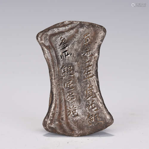 AN INSCRIBED SILVER INGOT