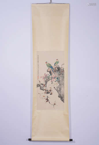 A CHINESE PAINTING HANGING SCROLL OF PARROTS AND FLOWERS