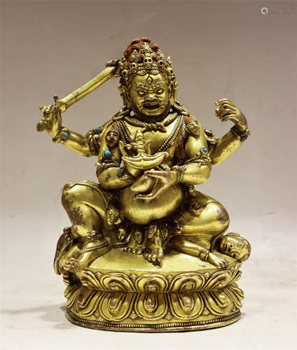 A HARDSTONES INLAID BRONZE SEATED MAHAKALA