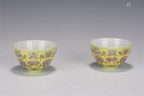 PAIR YELLOW GROUND AND COPPER RED BOWLS