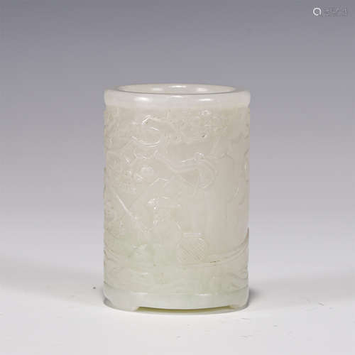 A CARVED WHITE JADE BRUSHPOT