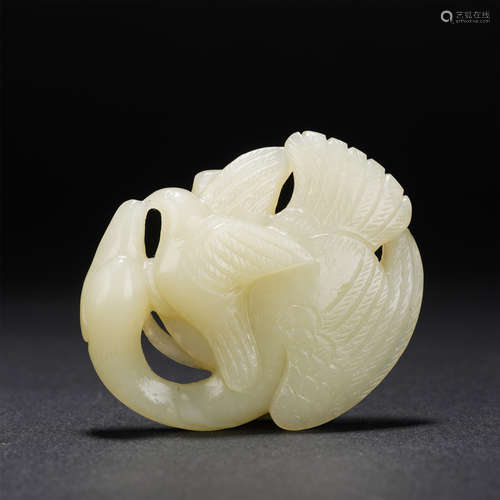 A CARVED WHITE JADE DECORATION