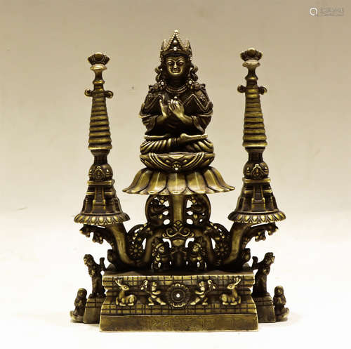 A BRONZE SEATED MAITREYA PALA STYLE