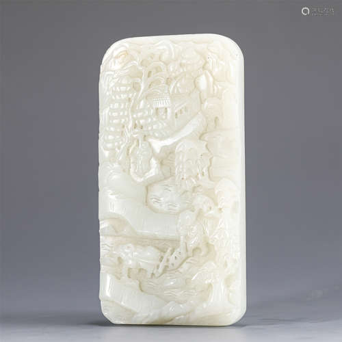 A CARVED WHITE JADE LANDSCAPE PANEL