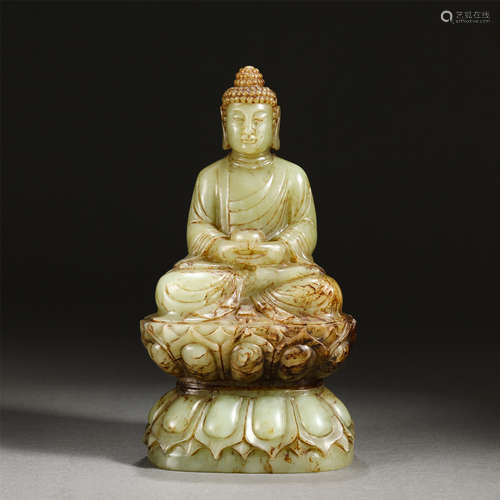 A CARVED PALE CELADON JADE AMITABHA