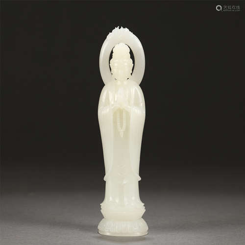 A CARVED WHTIE JADE STANDING GUANYIN