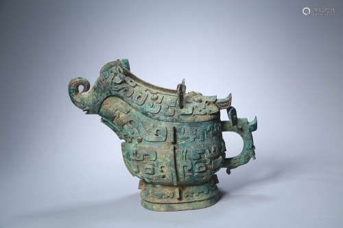 A Bronze Archaic Wine Vessel