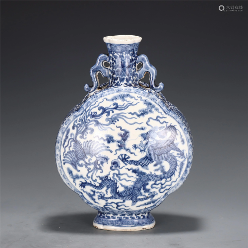 A BLUE AND WHITE DRAGON AND PHOENIX VASE
