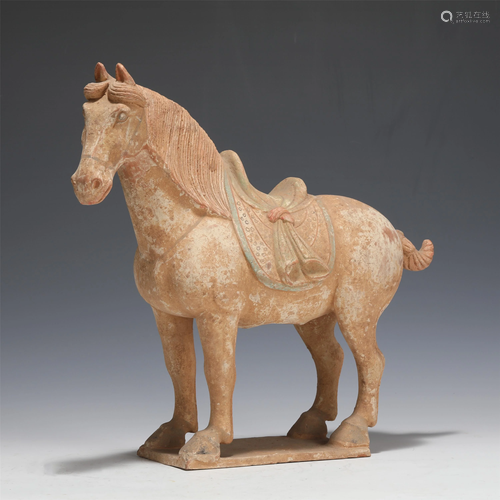 A POTTERY STANDING HORSE