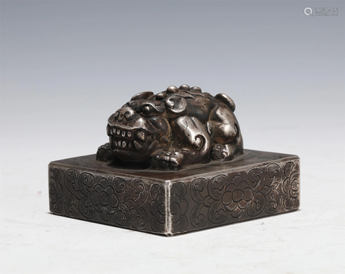 A BRONZE-ALLOY BEAST SEAL