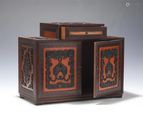 A FINE WOODEN CABINET