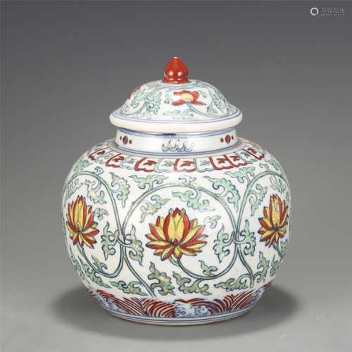 A DOUCAI GLAZED LOTUS SCROLLS JAR WITH COVER