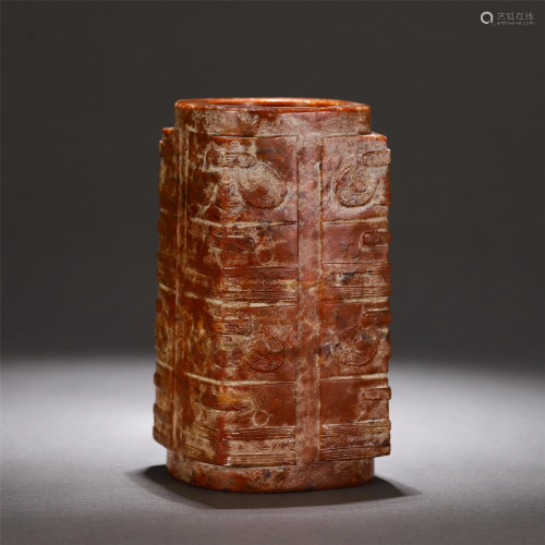 A CARVED RUSSET JADE CONG