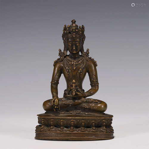 A BRONZE SEATED BHAIYAJYAGURU