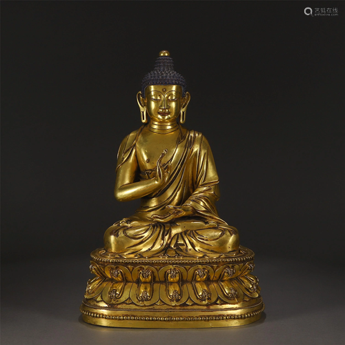 A GILT-BRONZE SEATED SHAKYAMUNI