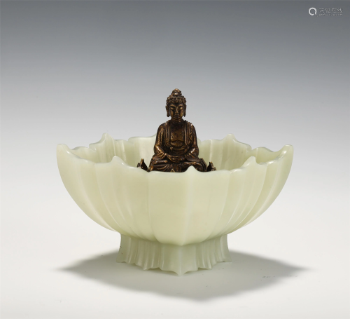 A RARE BRONZE SEATED BUDDHA WITH CARVED WHITE JADE…