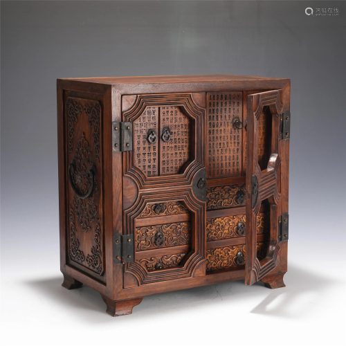 AN INSCRIBED HUANGHUALI CABINET