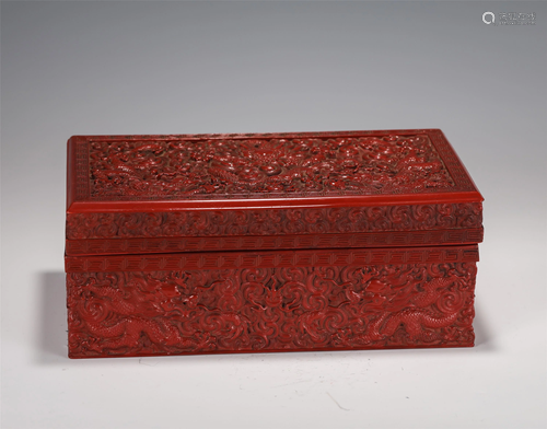 A CARVED CINNABAR LACQUER RECTANGULAR BOX