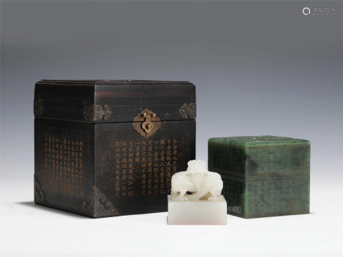 A RARE CARVED WHITE JADE SEAL WITH SPINACH GREEN JADE