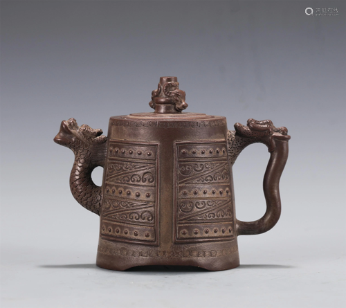 A YIXING GLAZED TEAPOT