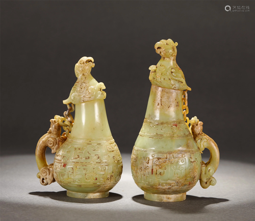 TWO CARVED YELLOW JADE WINE VESSELS