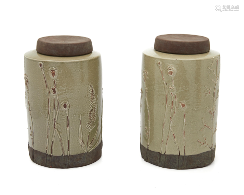 A pair of Asian pottery jars