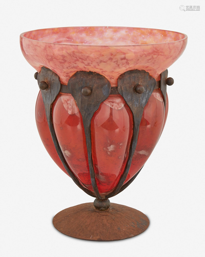 A French wrought iron mounted art glass vase