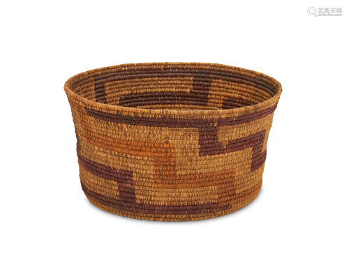 An Native American inspired polychrome raffia basket