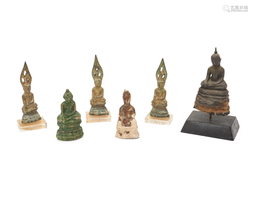 Six diminutive Buddha figures