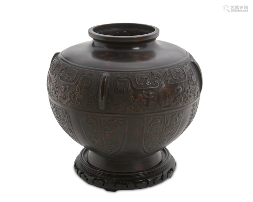 A Chinese bronze jardiniere with stand