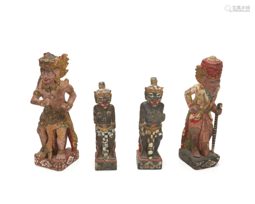 Four Balinese carved wood devotional figures