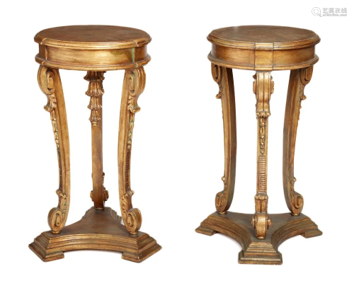 A pair of carved giltwood fern stands
