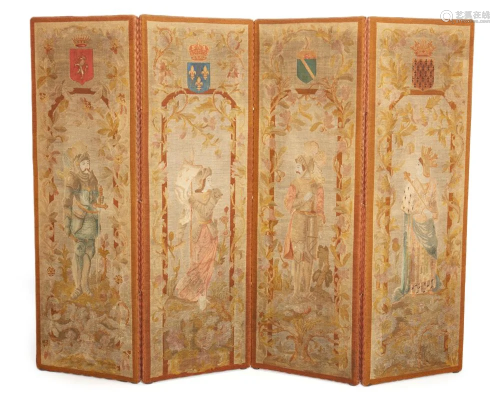 A petit point embroidered four-panel folding screen