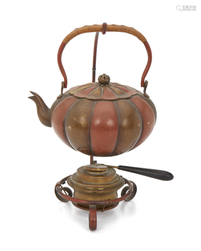 A Japanese metal teapot and burner