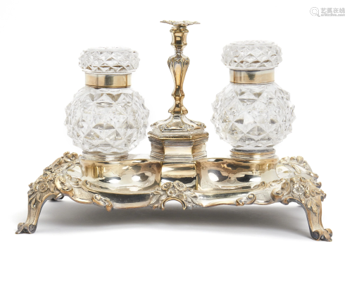 A silver plated and cut crystal footed double inkwell