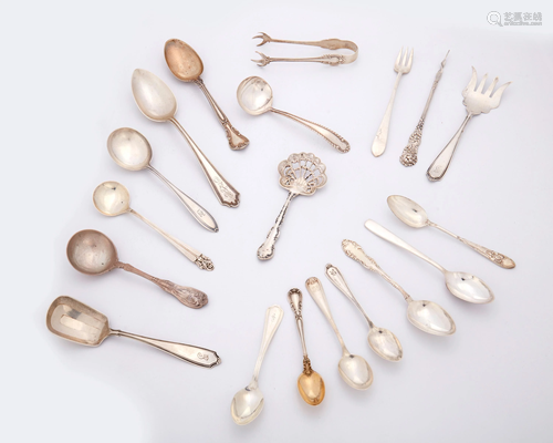 A group of sterling silver flatware items