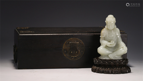 A CHINESE CARVED JADE BUDDHA STATUETTE