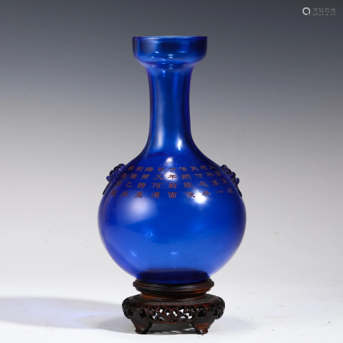 A CHINESE INSCRIBED BLUE GLASS VASE