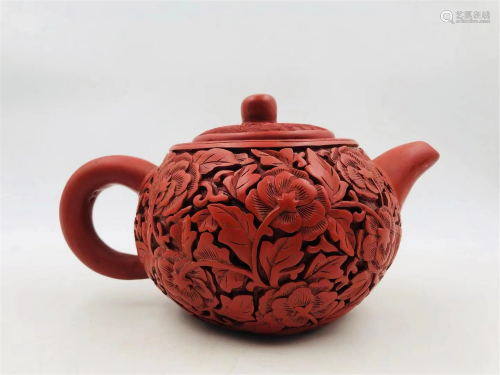 A CARVED RED LACQUER YIXING CLAY TEA POT