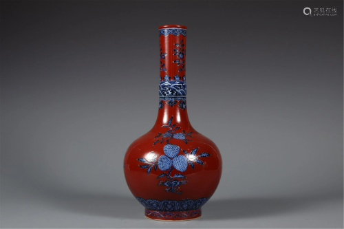A CHINESE RED GLAZED BLUE AND WHITE VASE
