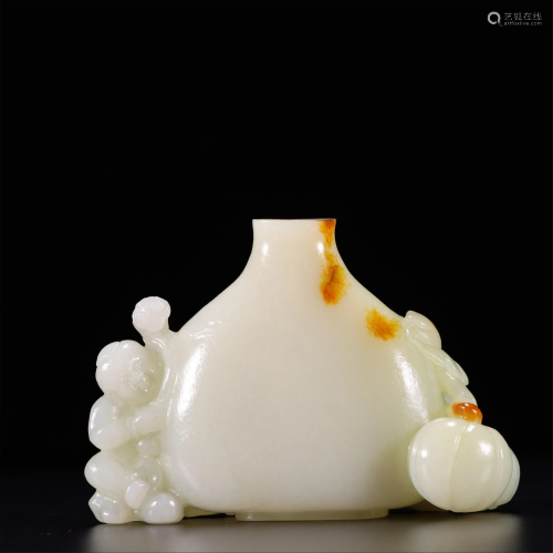 A CHINESE WHITE JADE KIDS AND MELONS SNUFF BOTTLE