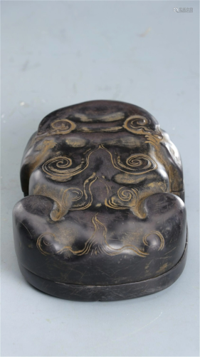 A CHINESE BEAST SHAPED INK-STONE