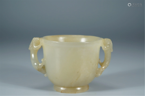 A CHINESE JADE CUP WITH CHI-DRAGON HANDLES