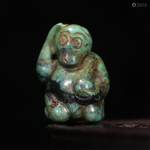 A TURQUOISE CARVING OF MONKEY